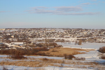 A landscape with a city in the distance