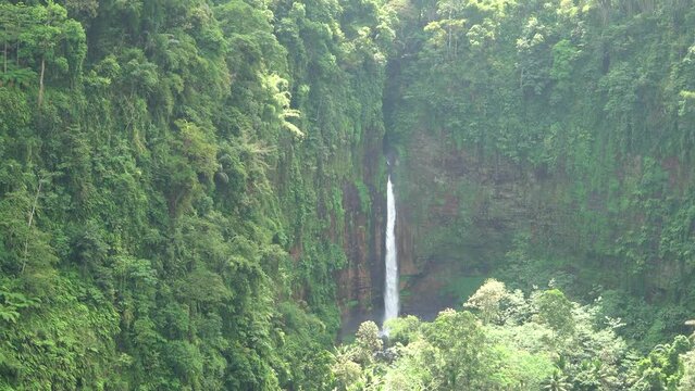 Aerial view of Coban Kapas Biru waterfall. East Java, Indonesia