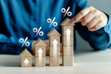 Businessman planning tax income and investment real estate return income, Home loan Interest rate...