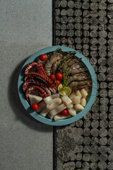 A plate with raw seafood