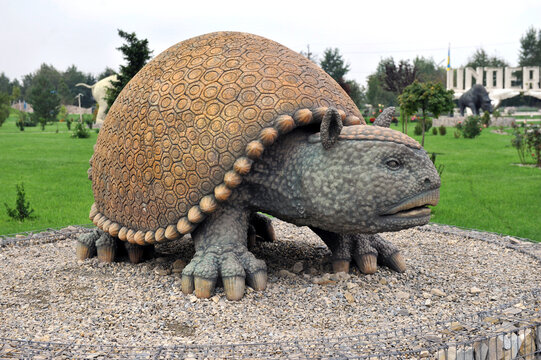 Pidhirya village, Ivano-Frankivsk region, Ukraine - September 26, 2023: Full-size concrete statue of armadillo (Doedicurus) at Land History Park.