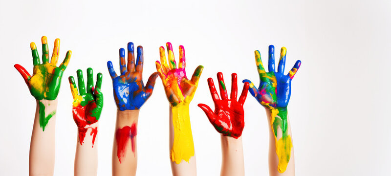 Children's Day, Many children's hands paint colorful paint on children's raised hands, isolated on a white background