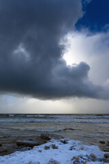 Snow clouds above Baltic sea.