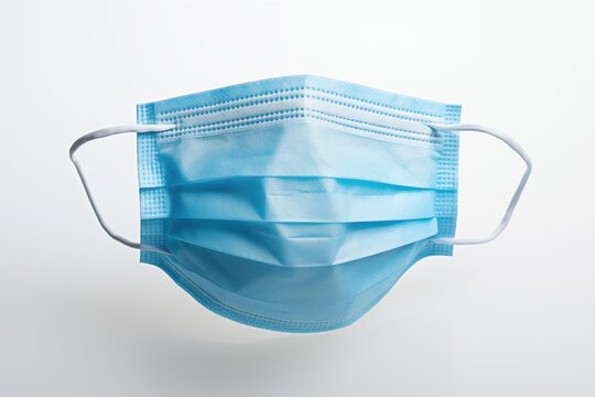 AI generated illustration of A close-up image of a blue surgical mask