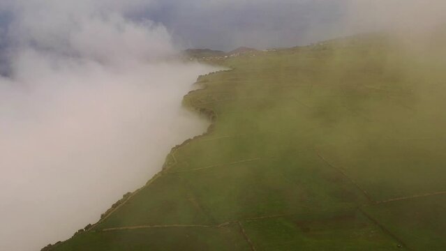 Aerial view of a mountain ridge with low clouds at Pico Malpaso, El Hierro Island, Canary Islands, Spain.