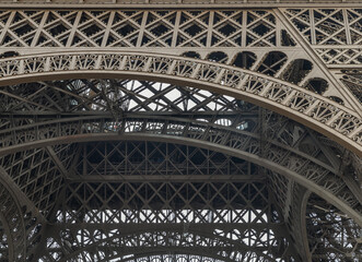 Architectural detail design of the famous Eiffel Tower iron structure. Close-up of the framework of the Eiffel Tower in Paris, France, Space for text, Selective focus.