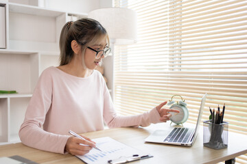 Businesswoman analyzes data graphs and works intently in his personal office, Employees working in the office, Businessman at Desk.