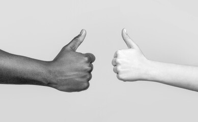 Woman hands showing thumbs up. Black lives matter. Support encourage. African male hand showing thumb up. Black and White hands showing Like together. Black and white