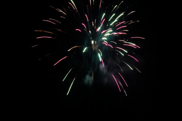 Firework. Colorful festive fireworks, standing out against the black sky. A shot of a bright fireworks explosion. Explosion. Firework. An overlay. new year. christmas, independence day, birthday, holi