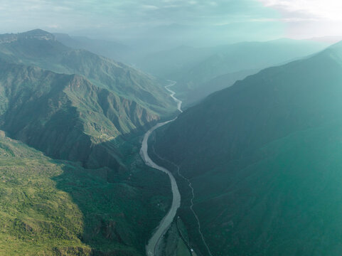 Aerial view of Rio Umpala, a river crossing the canyon across the mountain range in Jordan, Santander, Colombia.