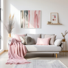 A modern living room's interior design features a grey sofa adorned with pink pillows and a blanket against a white wall with an abstract art poster.