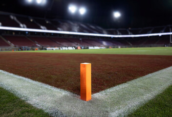 Close up view of a the end zone of a generic football stadium at night. Low angle view. Good generic college or professional football concept photo