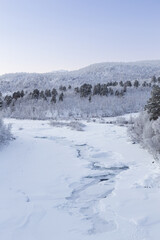 Frozen river in Abisko Nationalpark in winter scenery. Sweden, Arctic Circle, Swedish Lapland