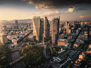 Aerial view of Mexico City financial district with skyscrapers and downtown at sunset, Mexico.