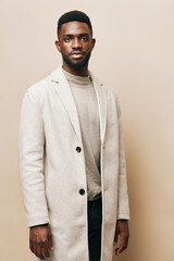 african man american grey black american background young guy portrait beige fashion african
