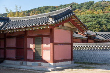 Fototapeta premium Hwaseong Haenggung, temporary palace where the king used to stay when he traveled outside of Seoul, South Korea. with the autumn nature background. It is famous as K-drama filming location.