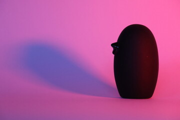 A small decorative black wooden bird with shading. Perfect as a wallpaper.