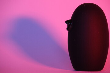 A small decorative black wooden bird with shading. Perfect as a wallpaper.