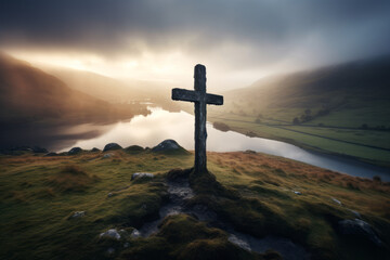 Old cross sits on a mound field at sunrise, traditional british landscapes, mountainous Scottish vistas. Celtic Religion, Historical Site - obrazy, fototapety, plakaty