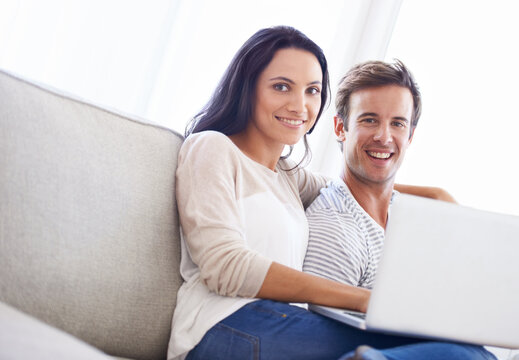 Couple, laptop and portrait on sofa with care, living room and wellness in marriage for bonding together. Face , woman and man for happy in committed relationship, relax weekend and love in apartment