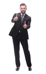 full length .smiling businessman showing thumbs up