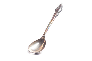 Old teaspoon isolated on white background