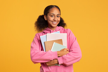 Happy African Student Girl Posing With College Work Books, Studio