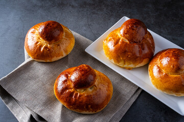 Palermo brioches, typical sweets of Sicilian cuisine. dark background
