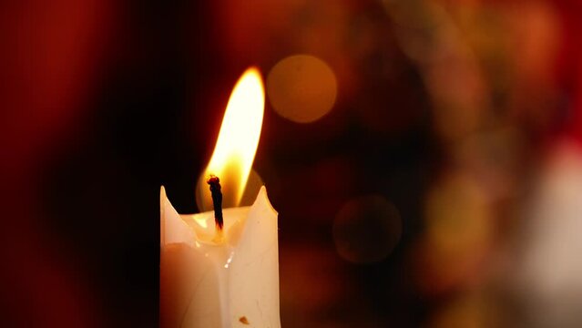 Candle with bokeh light background