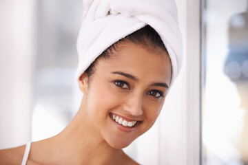 Woman, portrait and happy for skincare in bathroom, smiling and pride for beauty or facial treatment. Indian female person, dermatology and luxury cosmetics for wellness, healthy and glowing skin