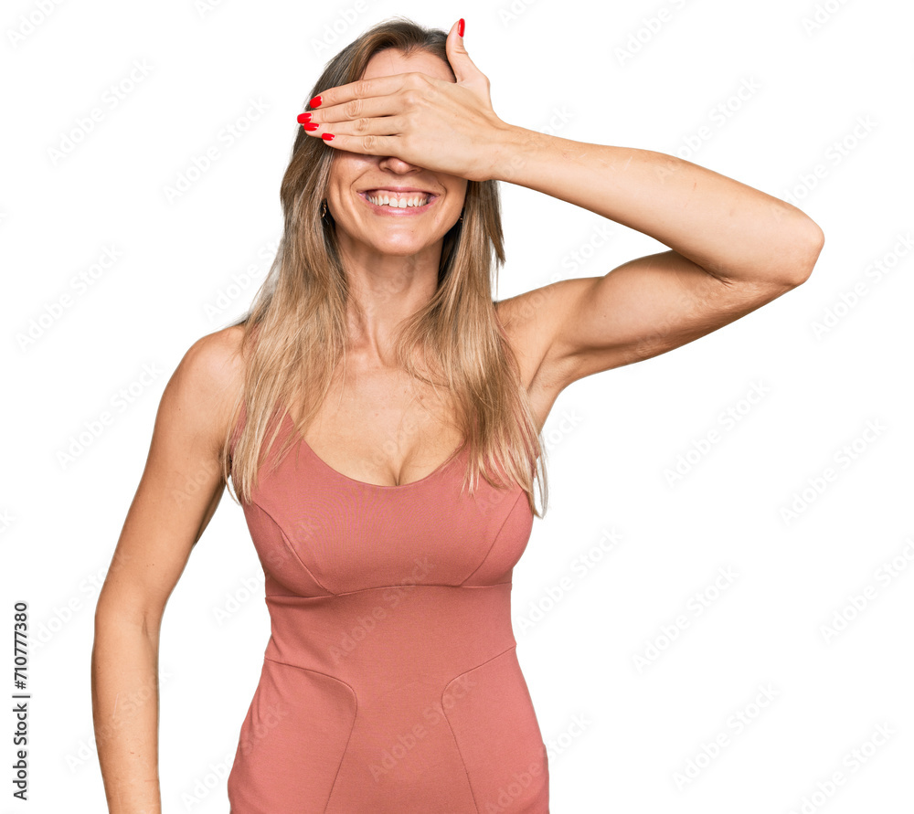 Canvas Prints Beautiful caucasian woman wearing casual clothes smiling and laughing with hand on face covering eyes for surprise. blind concept.