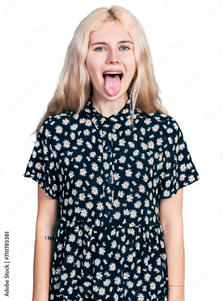 Sticker Young caucasian woman together sticking tongue out happy with funny expression. emotion concept.