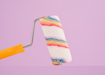 Paint roller and idea of fashion home design. Copy space for text.