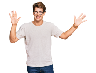 Handsome caucasian man wearing casual clothes and glasses showing and pointing up with fingers number ten while smiling confident and happy.