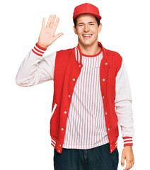 Handsome caucasian man wearing baseball uniform showing and pointing up with fingers number five while smiling confident and happy.