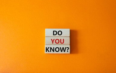 Do you know symbol. Concept word Do you know on wooden cubes. Beautiful orange background. Business and Do you know concept. Copy space.