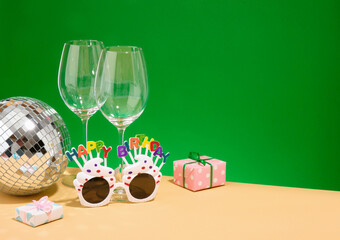 Alcohol festive party at the club. Cocktails, gifts and cheer. Copy space for text.