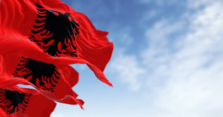 Albanian national flag waving in the wind on a clear day