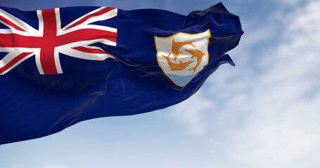 Anguilla Flag waving in the wind on a clear day - obrazy, fototapety, plakaty