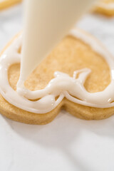 Heart-shaped sugar cookies with royal icing