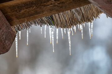 Icicles on the edge of the roof.
