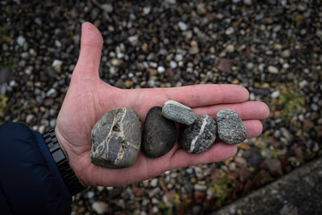 hand holding a stone