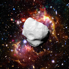 Asteroid flying in the deep space. Elements of this image furnished by NASA.