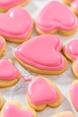 Heart-shaped sugar cookies with royal icing