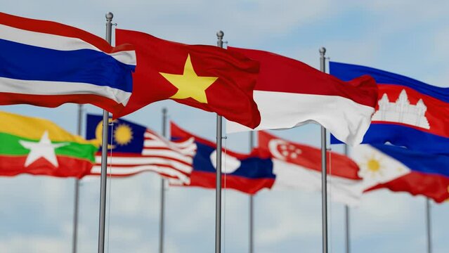 ASEAN or Association of Southeast Asian Nations flags waving together on cloudy sky, endless seamless loop