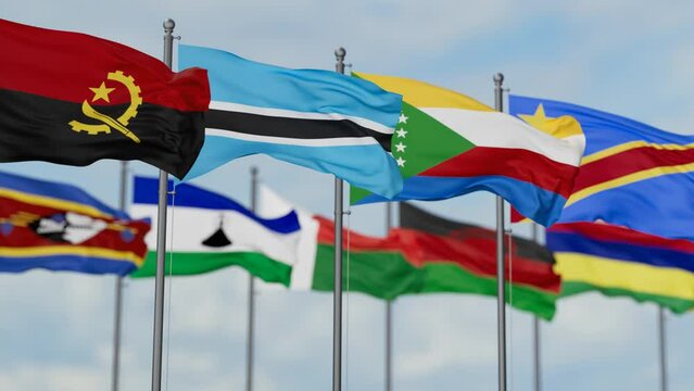 SADC or Southern African Development Community flags waving together on cloudy sky, endless seamless loop