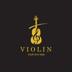gold violin with treble clef isolated on black background