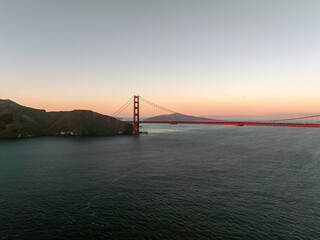 Fototapeta na wymiar Famous Golden Gate Bridge, San Francisco at sunset, USA. San Francisco's Golden Gate Bridge at sunset from Marin County