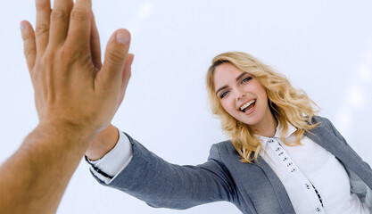successful business woman giving a high five