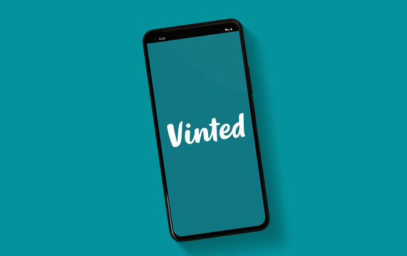 Vinted logo on mobile phone screen isolated on clean background - Warsaw, Poland - 16.01.2024